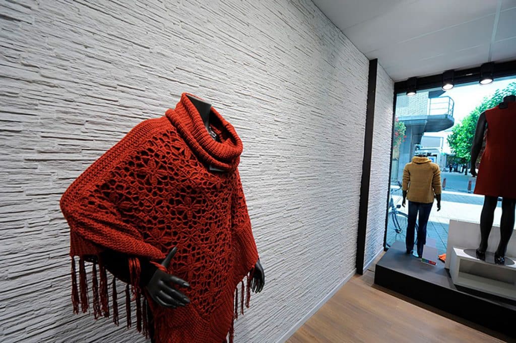 Paredes de una Tienda de Moda con Paneles de Piedra — stone-effect panels by PanelPiedra®
