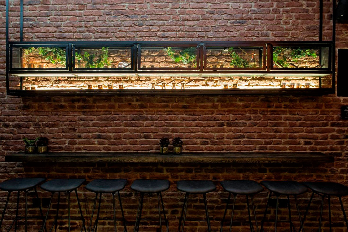 Cafetería Pastelería paneles ladrillo