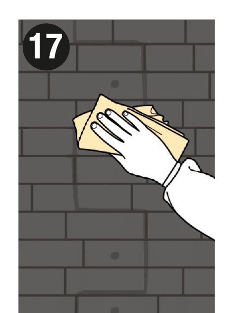 Step 17 of the installation: Then, without letting the paint dry, wipe with a damp cloth so the ageing settles into the pores of the panel. This can be repeated as often as needed.
